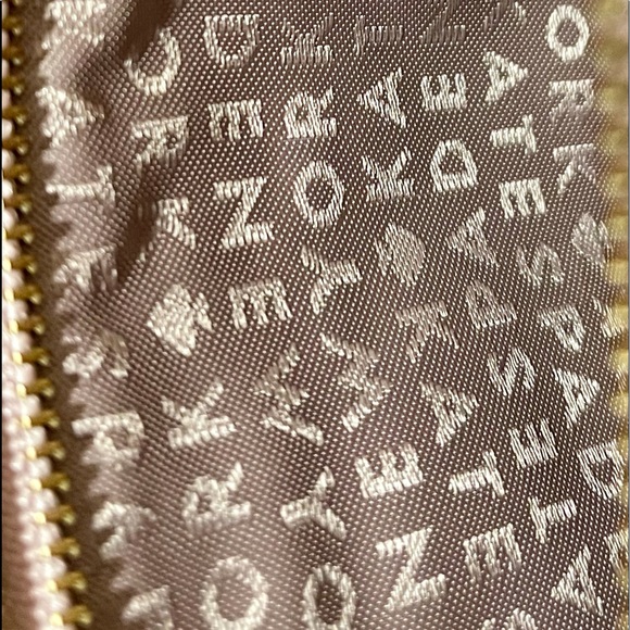 metallic leather wristlet by
KATE SPADE NEW YORK - Picture 16 of 17